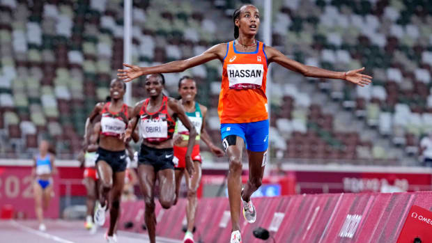 Sifan Hassan wins the women's 5,000 meters at the Tokyo Olympics ahead of Kenya's Hellen Obiri.